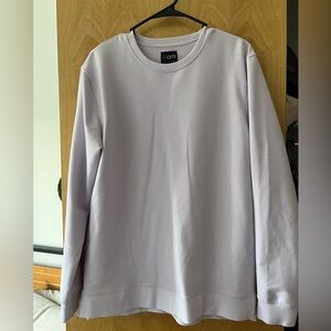 Cream cuts sweater